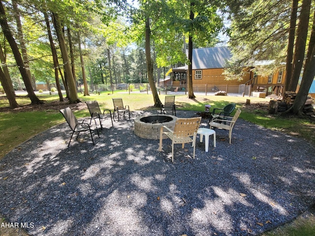 view of patio / terrace featuring a fire pit