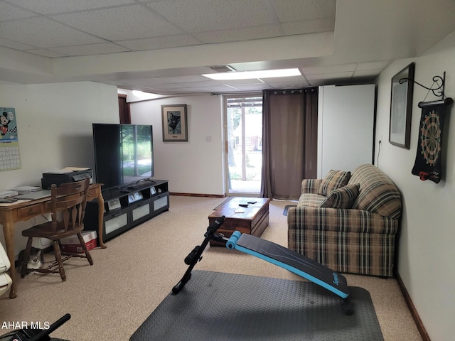 workout area featuring visible vents, a drop ceiling, light carpet, and baseboards