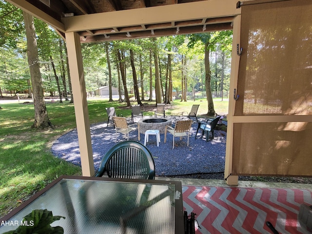 view of patio featuring an outdoor fire pit