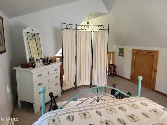 carpeted bedroom with lofted ceiling and a textured ceiling