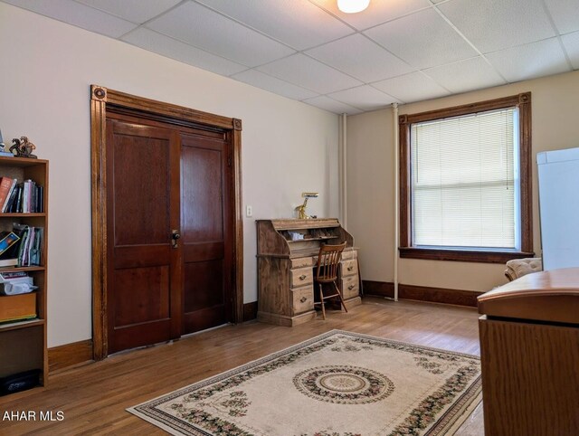 902 Main St, Saxton, PA 16678 - home office featuring a paneled ceiling, wood finished floors, and baseboards