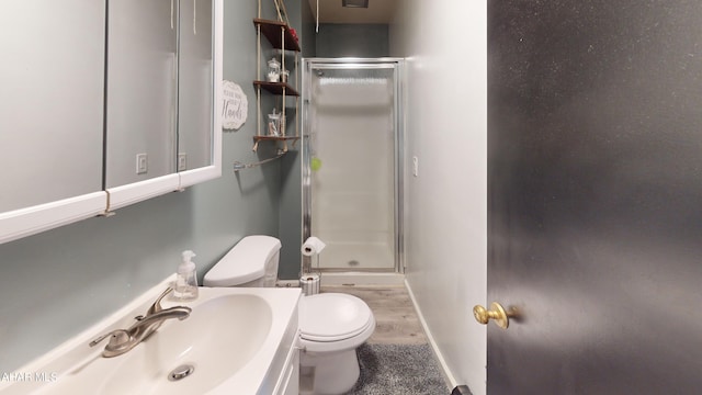 829 Ashcroft Ave, Cresson, PA 16630 - full bathroom featuring a shower stall, toilet, vanity, wood finished floors, and baseboards