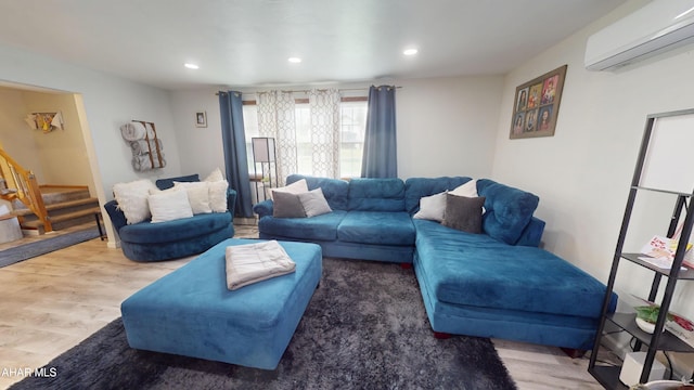 829 Ashcroft Ave, Cresson, PA 16630 - living area featuring a wall mounted air conditioner, wood finished floors, recessed lighting, and stairs