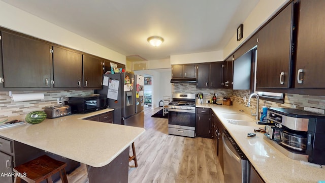 829 Ashcroft Ave, Cresson, PA 16630 - kitchen featuring stainless steel appliances, a sink, light countertops, and light wood-style floors