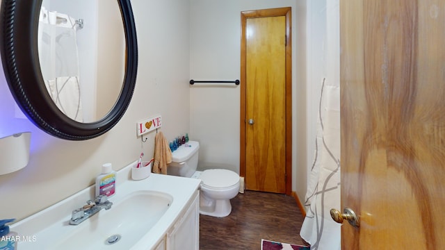 829 Ashcroft Ave, Cresson, PA 16630 - full bath featuring wood finished floors, vanity, and toilet