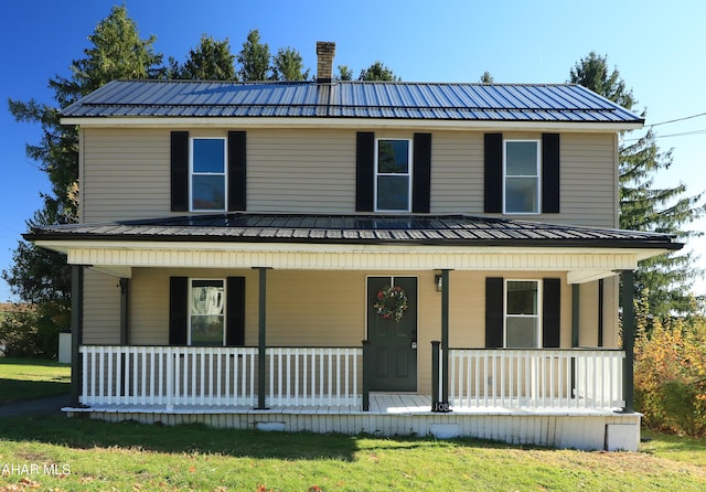 view of front of property featuring covered porch