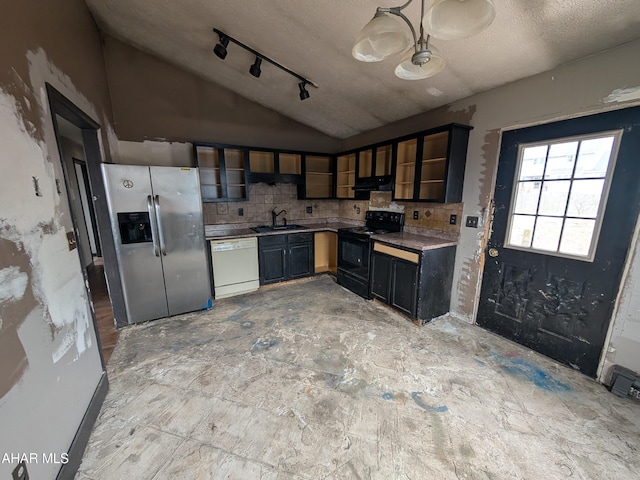 kitchen featuring lofted ceiling, sink, black electric range, stainless steel fridge with ice dispenser, and dishwasher