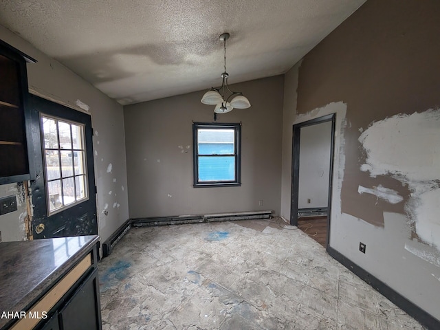 unfurnished dining area featuring lofted ceiling and a textured ceiling