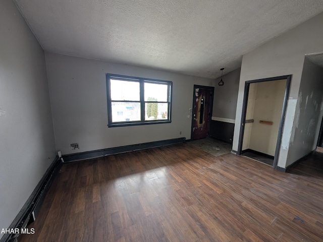 unfurnished bedroom with dark wood-type flooring, a baseboard radiator, a textured ceiling, and vaulted ceiling