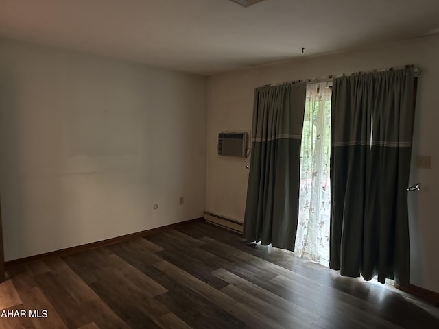 159 Hollidaysburg Sportsman Rd, Hollidaysburg, PA 16648 - unfurnished room with a baseboard radiator, an AC wall unit, wood finished floors, and baseboards