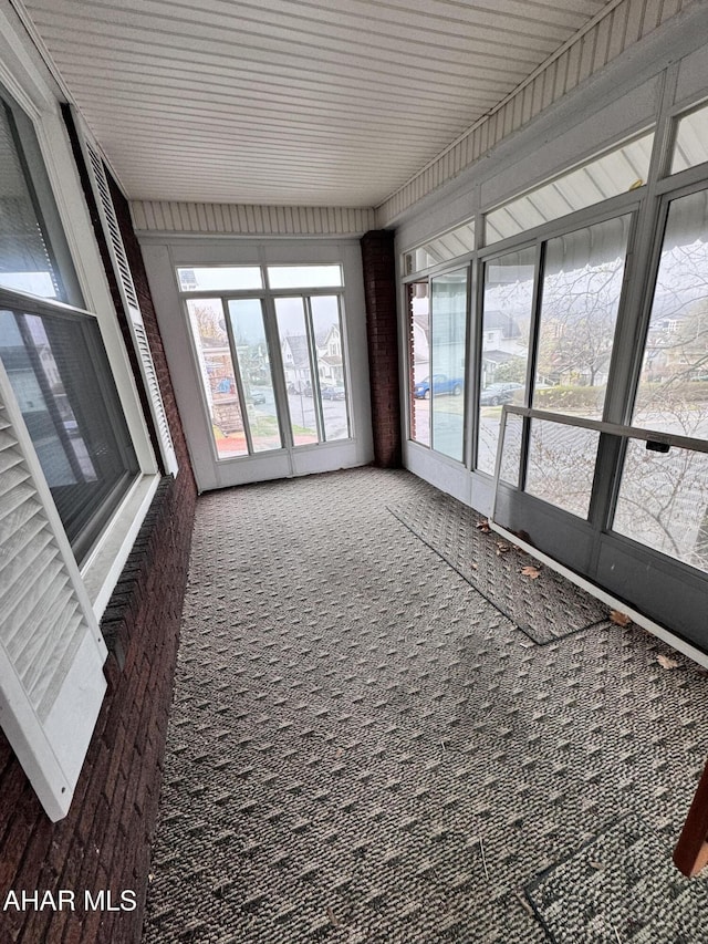 2123 2nd Ave, Altoona, PA 16602 - unfurnished sunroom with carpet flooring