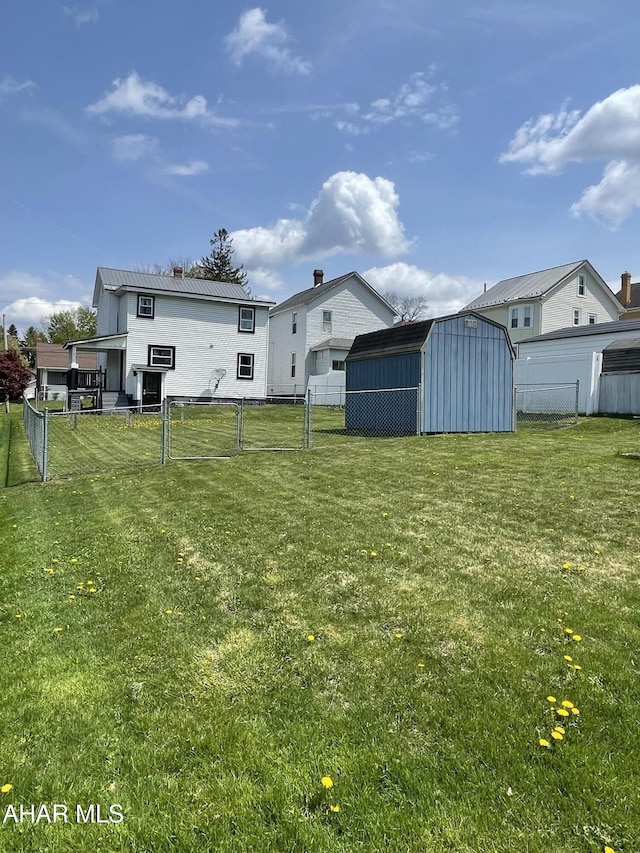 510 Ashcroft Ave, Cresson, PA 16630 - view of yard with a storage shed, fence, a gate, and an outdoor structure