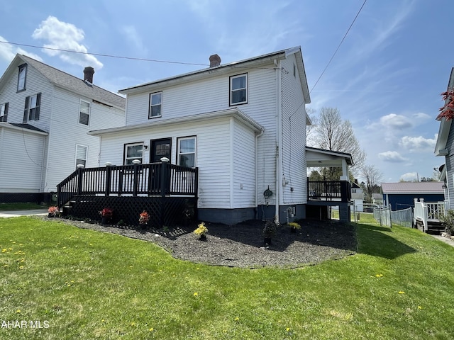 510 Ashcroft Ave, Cresson, PA 16630 - back of house featuring a lawn, a wooden deck, and a chimney