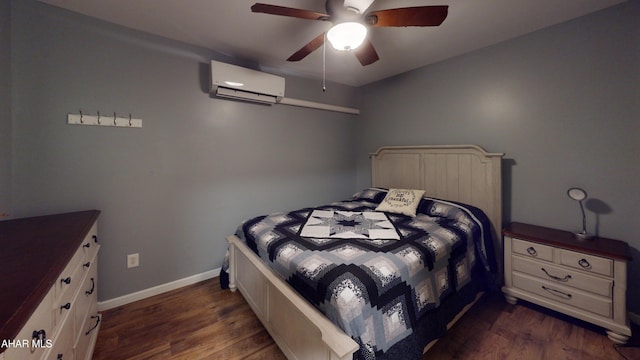 bedroom with dark hardwood / wood-style flooring, a wall unit AC, and ceiling fan