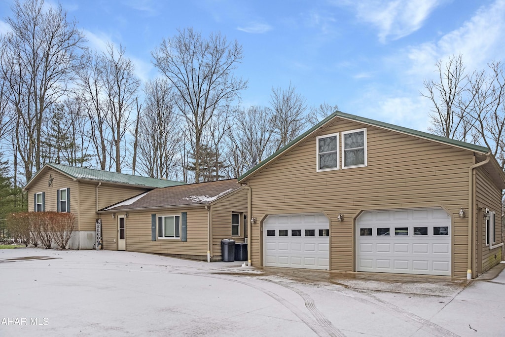 view of front of home with a garage