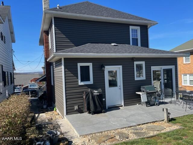 rear view of house with a patio area