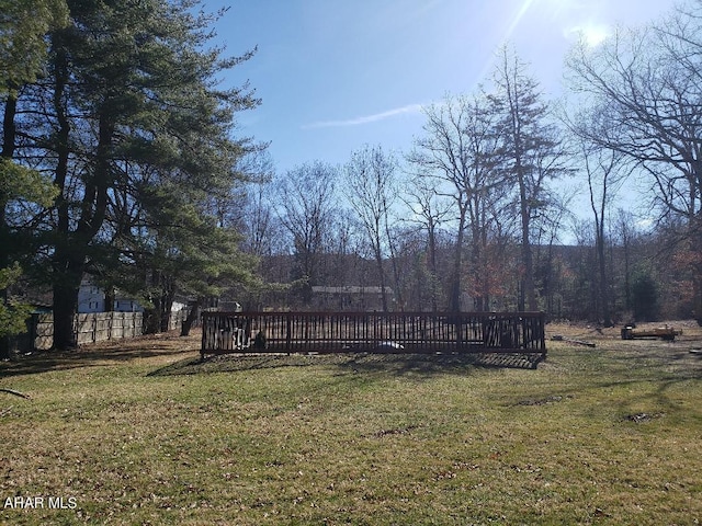 view of yard with a deck