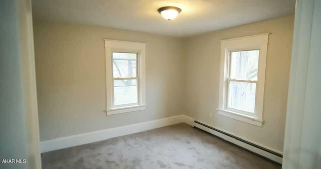 1761 Princeton Rd, Altoona, PA 16602 - spare room featuring a baseboard heating unit, healthy amount of natural light, and carpet