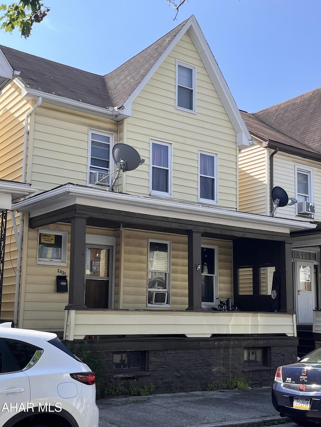 2421 5th Ave, Altoona, PA 16602 - view of front of house featuring a porch and roof with shingles