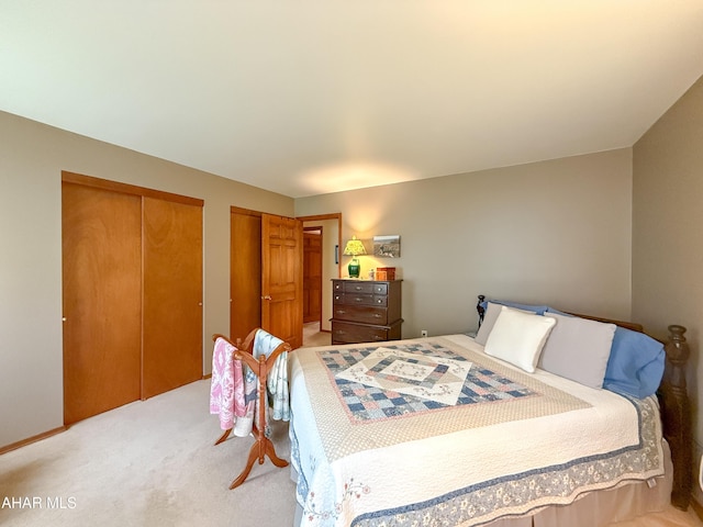 6334 Black Valley Rd, Everett, PA 15537 - bedroom featuring two closets and light carpet