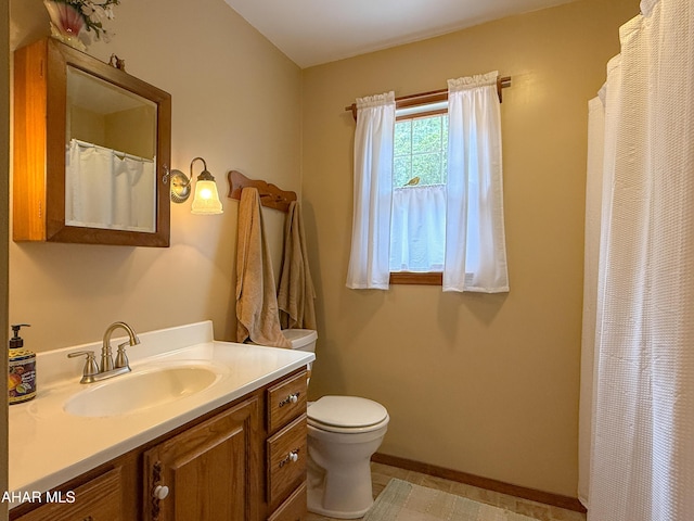 6334 Black Valley Rd, Everett, PA 15537 - bathroom featuring baseboards, toilet, and vanity