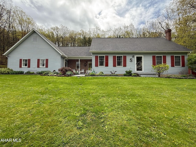 6334 Black Valley Rd, Everett, PA 15537 - ranch-style house with roof with shingles, a chimney, and a front lawn