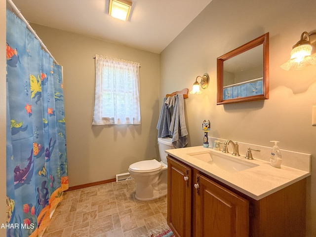 6334 Black Valley Rd, Everett, PA 15537 - bathroom featuring vanity, toilet, visible vents, stone finish floor, and baseboards