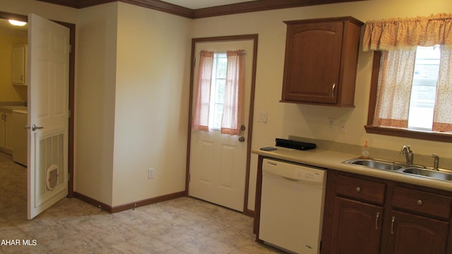 kitchen featuring crown molding, dishwasher, dark brown cabinets, and sink