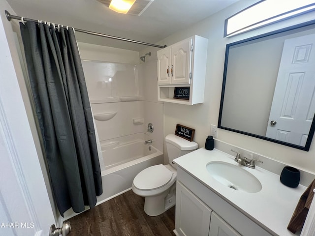 full bathroom featuring vanity, shower / bathtub combination with curtain, wood-type flooring, and toilet