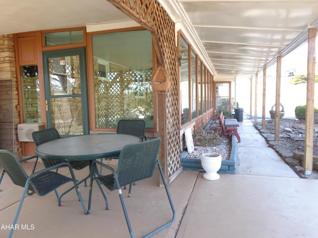 view of patio featuring outdoor dining space