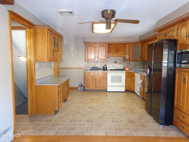 kitchen with visible vents, decorative backsplash, custom exhaust hood, white appliances, and a ceiling fan