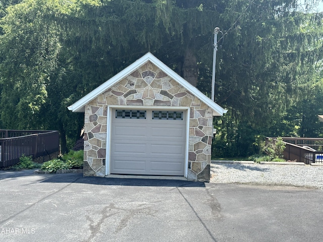 328 Avalon Rd, Altoona, PA 16601 - detached garage with a wooded view and asphalt driveway