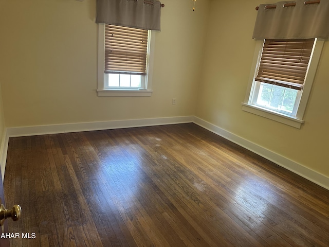 328 Avalon Rd, Altoona, PA 16601 - spare room featuring baseboards and dark wood-type flooring