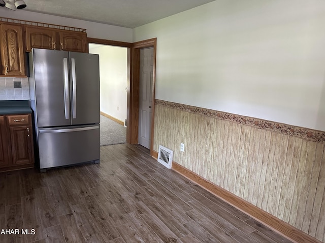 328 Avalon Rd, Altoona, PA 16601 - kitchen featuring freestanding refrigerator, wainscoting, dark wood-style flooring, and dark countertops