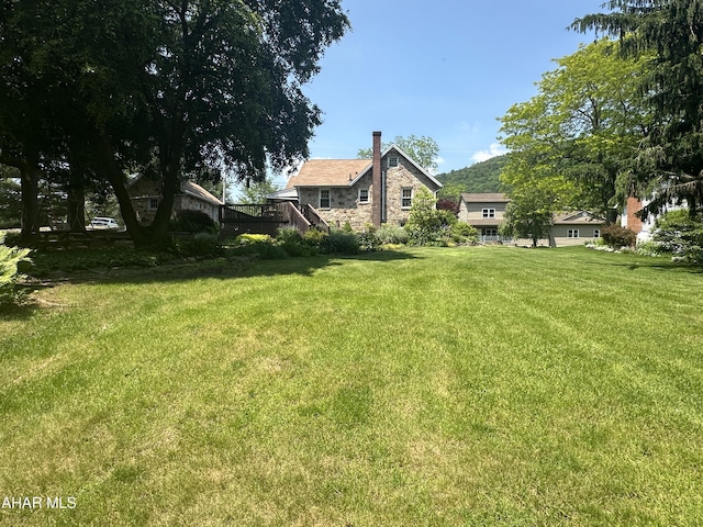 328 Avalon Rd, Altoona, PA 16601 - view of green lawn featuring a wooden deck