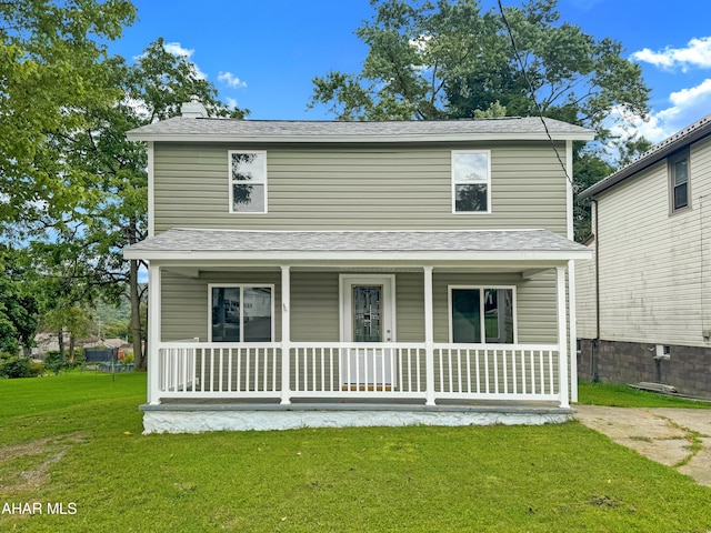 front facade with a front yard