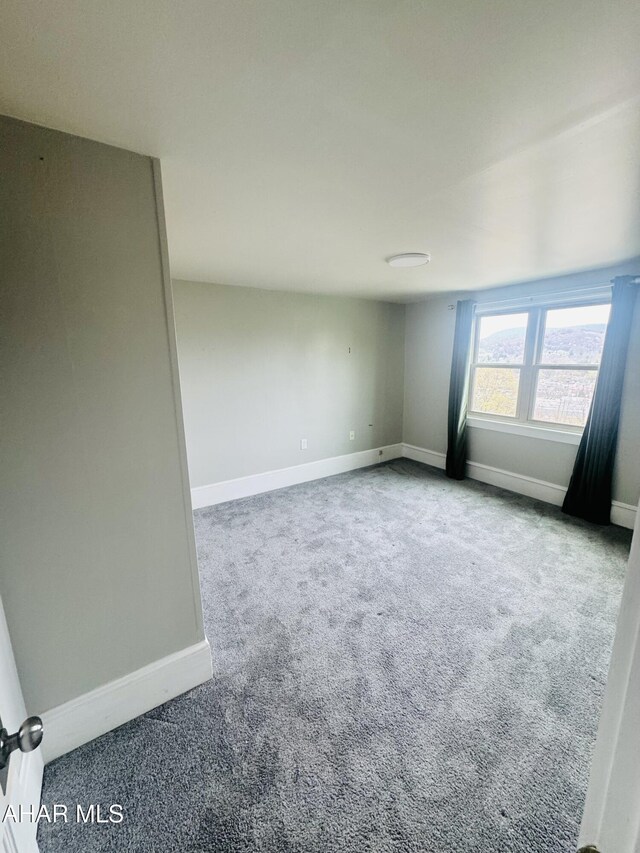 5017 Highland Park Ave, Altoona, PA 16602 - empty room featuring baseboards and carpet flooring