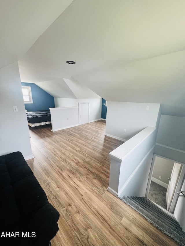 5017 Highland Park Ave, Altoona, PA 16602 - stairs with vaulted ceiling and wood finished floors