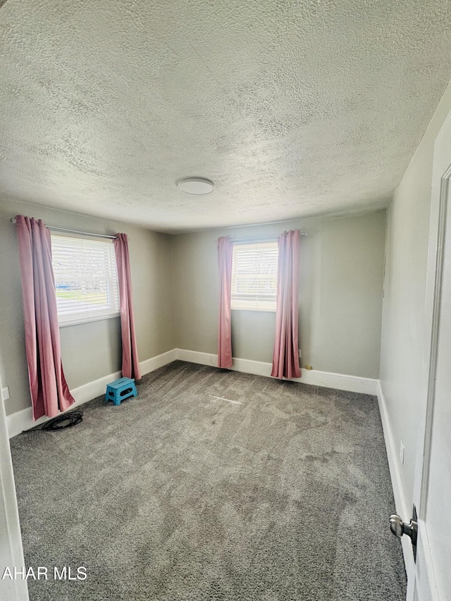 5017 Highland Park Ave, Altoona, PA 16602 - unfurnished room with carpet floors and a textured ceiling