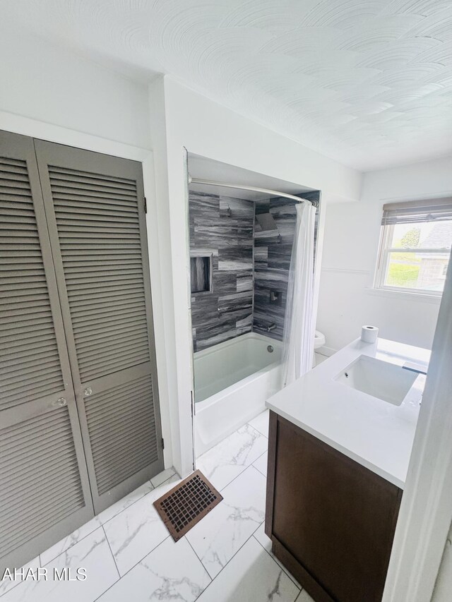 5017 Highland Park Ave, Altoona, PA 16602 - full bathroom with marble look tile flooring, shower / tub combo, vanity, and a closet