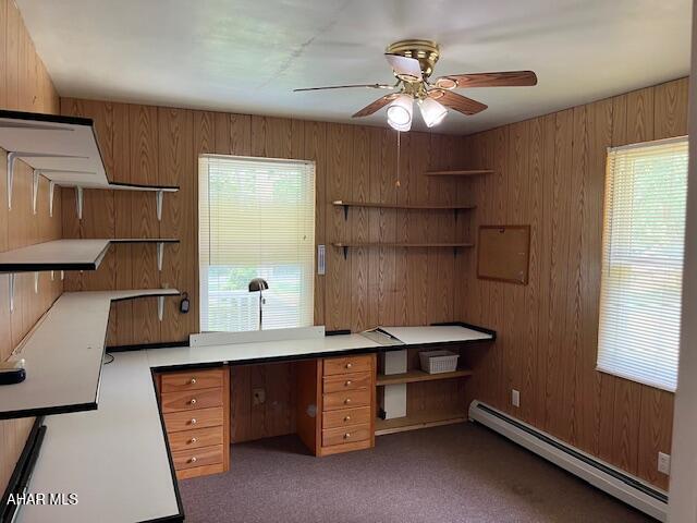 6331 Hyndaman Rd, Buffalo Mills, PA 15534 - unfurnished office featuring baseboard heating, ceiling fan, wood walls, and carpet flooring