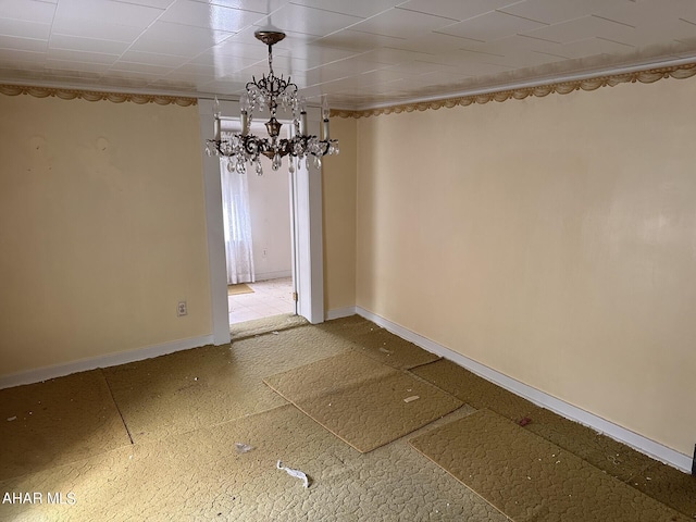 unfurnished dining area with an inviting chandelier