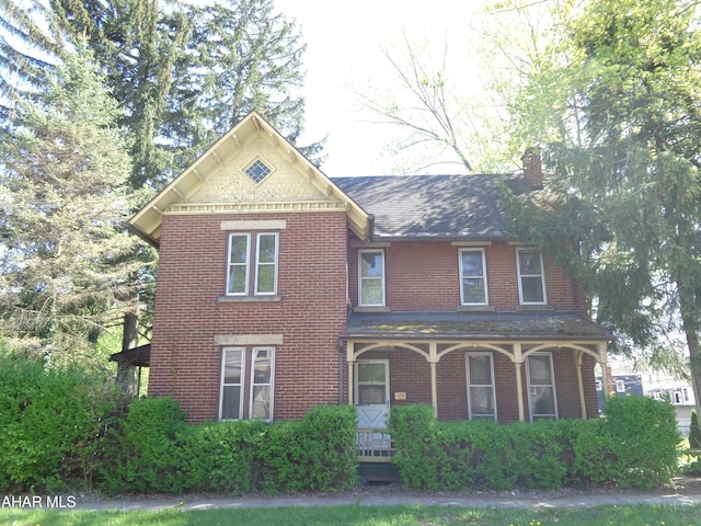 708 Blair St, Hollidaysburg, PA 16648 - view of front of property featuring a porch, a chimney, and brick siding