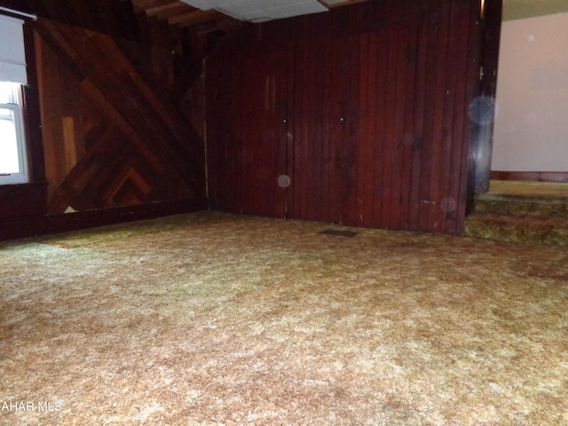 708 Blair St, Hollidaysburg, PA 16648 - carpeted spare room featuring wood walls