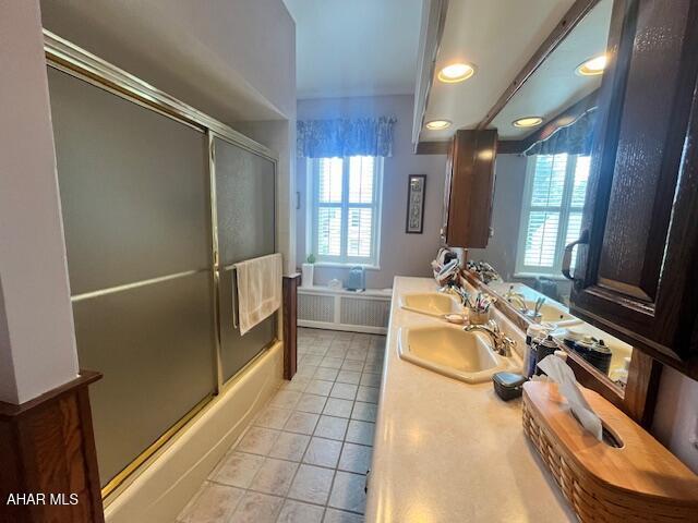 522 Wayne St, Hollidaysburg, PA 16648 - full bathroom with tile patterned floors, healthy amount of natural light, double vanity, combined bath / shower with glass door, and recessed lighting