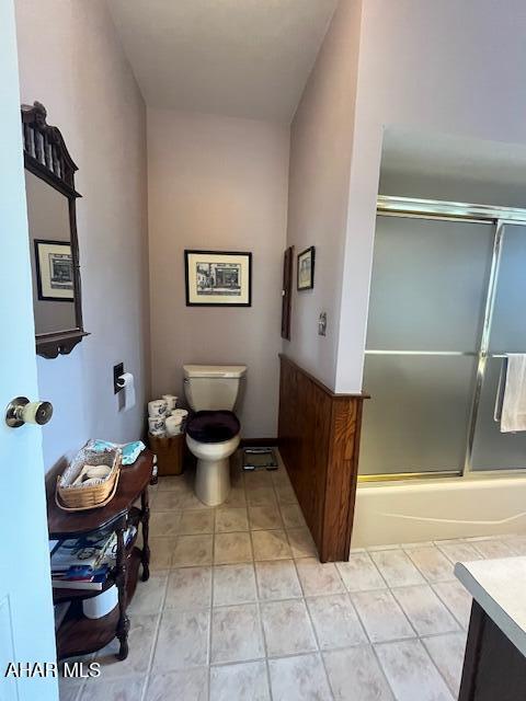 522 Wayne St, Hollidaysburg, PA 16648 - full bathroom with vanity, enclosed tub / shower combo, and tile patterned floors