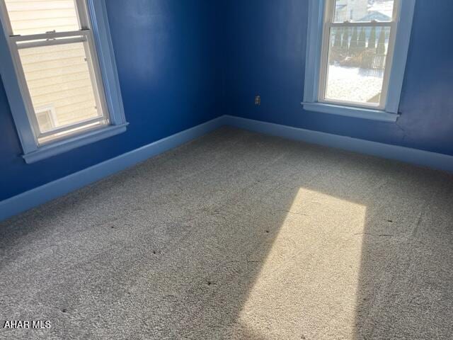 spare room with carpet flooring