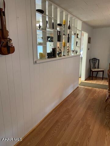 bar featuring hardwood / wood-style floors