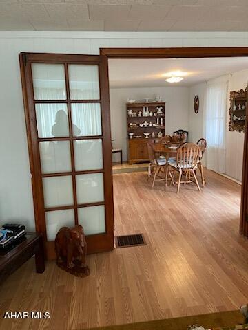 dining area featuring hardwood / wood-style floors