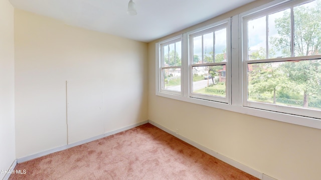 1113 Broadway, Altoona, PA 16601 - spare room featuring light carpet and baseboards